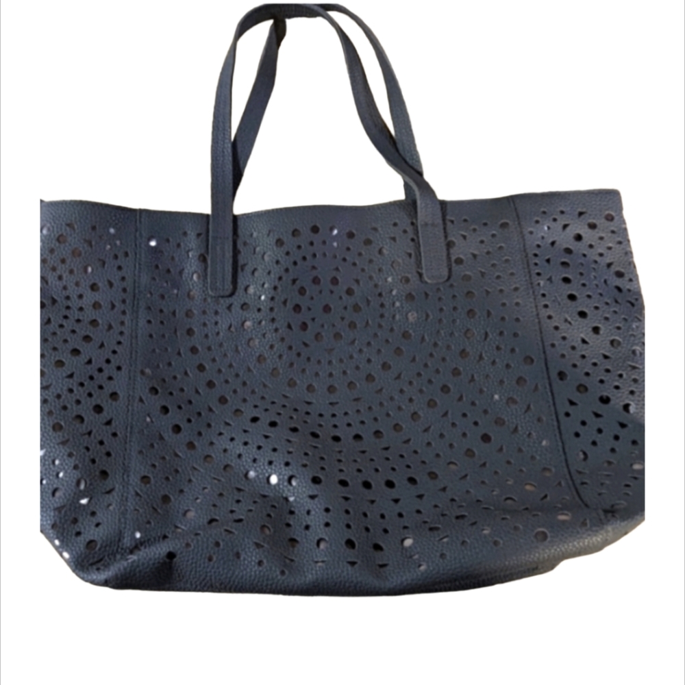Tote. Faux Leather Lazer cut tote.